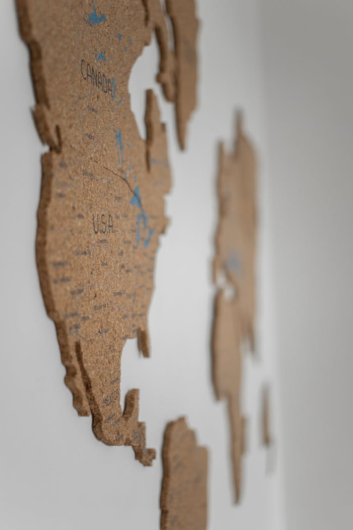 Modern cork map of the USA and Canada on a minimalist wall. Ideal for decor inspiration.